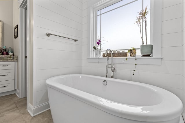 4252 Inlet Loop, Chattanooga, TN 37416 - bathroom featuring a freestanding tub, vanity, and tile patterned floors