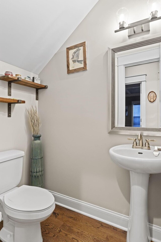 4252 Inlet Loop, Chattanooga, TN 37416 - bathroom with lofted ceiling and wood finished floors