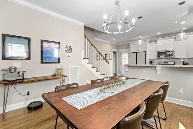4252 Inlet Loop, Chattanooga, TN 37416 - dining room featuring wood finished floors, stairs, ornamental molding, a chandelier, and recessed lighting