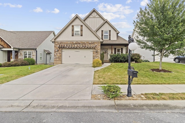 4252 Inlet Loop, Chattanooga, TN 37416 - craftsman house with stone siding, an attached garage, board and batten siding, a front yard, and concrete driveway