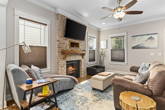 4252 Inlet Loop, Chattanooga, TN 37416 - living area featuring wood finished floors, a ceiling fan, crown molding, a brick fireplace, and recessed lighting