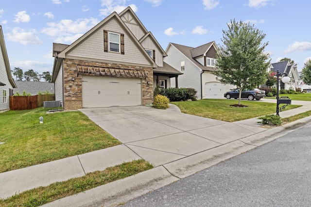 4252 Inlet Loop, Chattanooga, TN 37416 - craftsman-style house featuring concrete driveway, board and batten siding, stone siding, and an attached garage