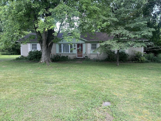1465 Old Farmington Rd, Lewisburg, TN 37091 - view of front of home featuring a front yard and brick siding