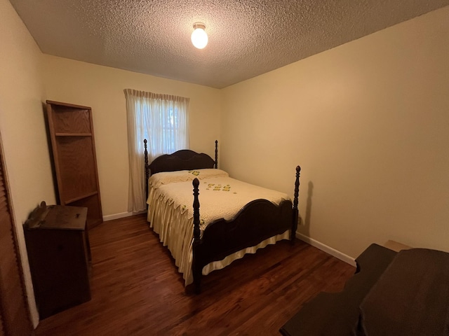 1465 Old Farmington Rd, Lewisburg, TN 37091 - bedroom featuring dark wood-type flooring and a textured ceiling