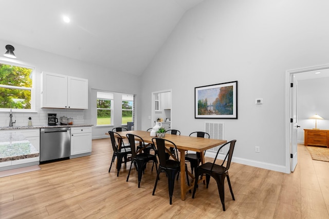 5283 Eagleville Pike, Eagleville, TN 37060 - dining area featuring high vaulted ceiling, light wood-style flooring, and plenty of natural light