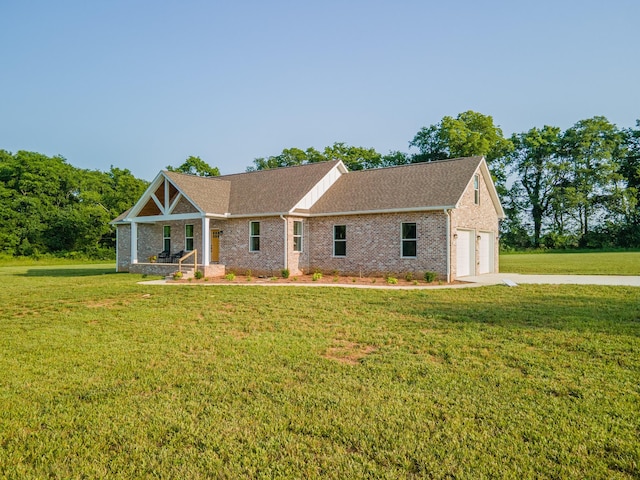 5283 Eagleville Pike, Eagleville, TN 37060 - view of front facade featuring a front lawn, concrete driveway, brick siding, and an attached garage