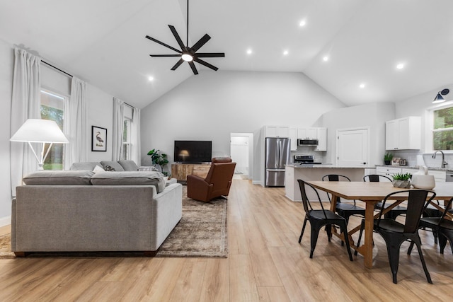 5283 Eagleville Pike, Eagleville, TN 37060 - living area featuring high vaulted ceiling, ceiling fan, light wood-style floors, and recessed lighting