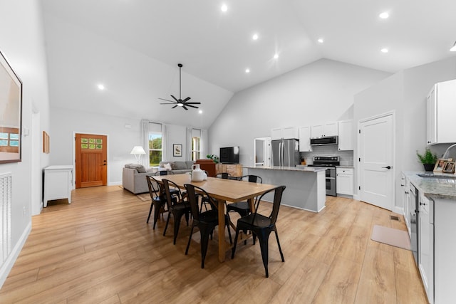 5283 Eagleville Pike, Eagleville, TN 37060 - dining space featuring high vaulted ceiling, light wood-style flooring, recessed lighting, and ceiling fan
