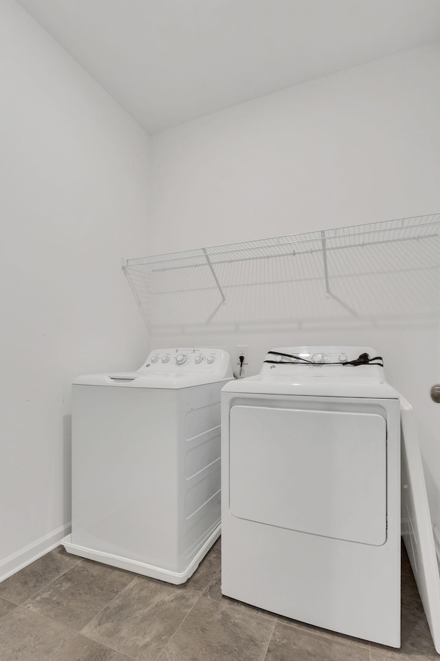 534 Morgan Meadows Way, Columbia, TN 38401 - laundry area with washer and clothes dryer and baseboards