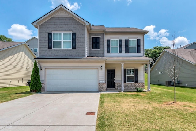 534 Morgan Meadows Way, Columbia, TN 38401 - view of front of house with an attached garage, concrete driveway, a front yard, a porch, and stone siding