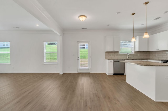 534 Morgan Meadows Way, Columbia, TN 38401 - kitchen with dishwasher, ornamental molding, light wood-style floors, plenty of natural light, and white cabinets