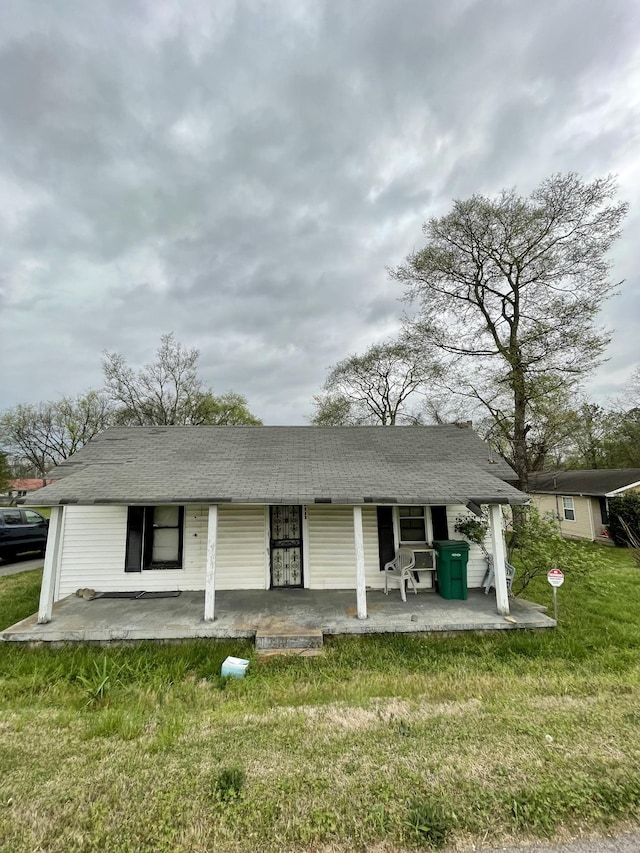2639 Duplex Rd, Spring Hill, TN 37174 - view of front of house featuring a porch, a front lawn, and roof with shingles