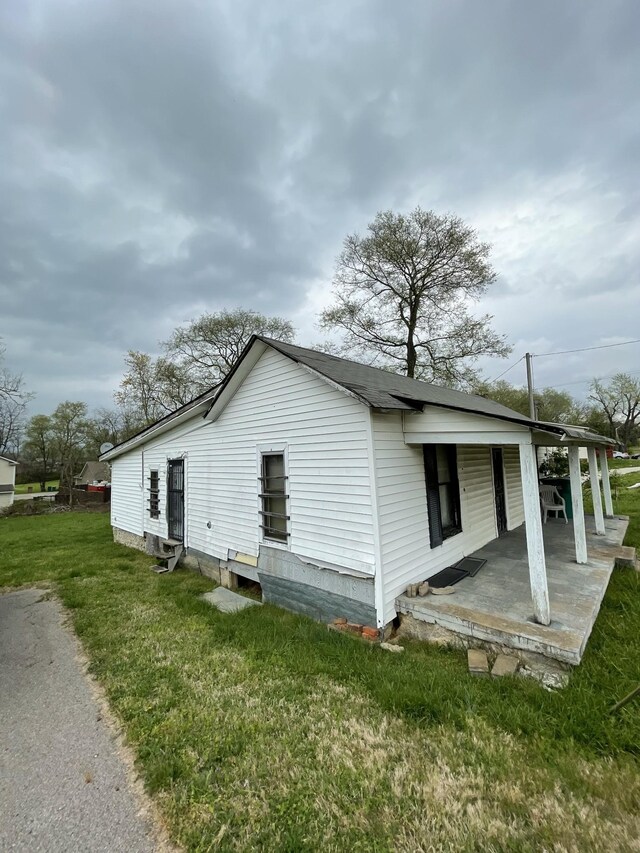 2639 Duplex Rd, Spring Hill, TN 37174 - view of home's exterior with a lawn and covered porch