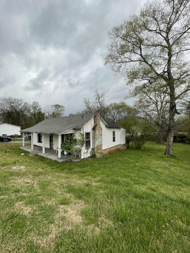 2639 Duplex Rd, Spring Hill, TN 37174 - view of side of property with a yard and a patio