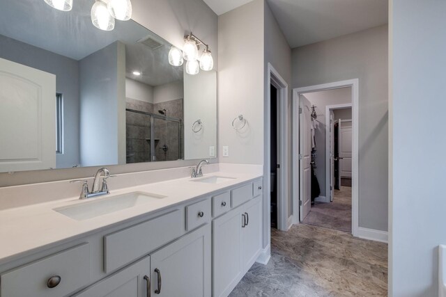 907 Nance Ln, Lebanon, TN 37087 - full bathroom featuring double vanity, a stall shower, and a walk in closet