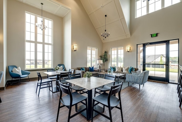 907 Nance Ln, Lebanon, TN 37087 - dining space with a chandelier, high vaulted ceiling, and wood finished floors