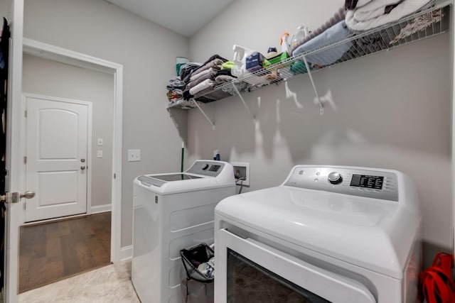 907 Nance Ln, Lebanon, TN 37087 - laundry area with washer and clothes dryer and wood finished floors