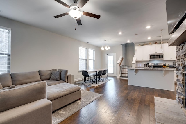 907 Nance Ln, Lebanon, TN 37087 - living room featuring ceiling fan, a chandelier, dark wood-type flooring, and recessed lighting