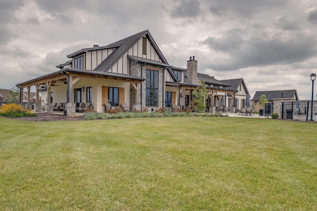 907 Nance Ln, Lebanon, TN 37087 - back of house with board and batten siding, a patio area, and stone siding