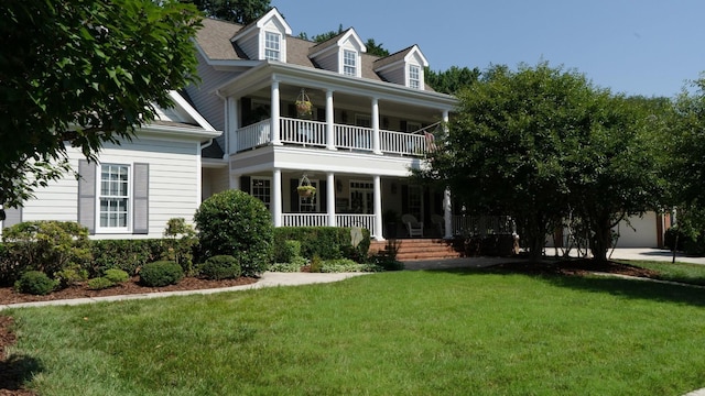 9545 Windrose Cir, Chattanooga, TN 37421 - view of front of property with a balcony, covered porch, and a front yard