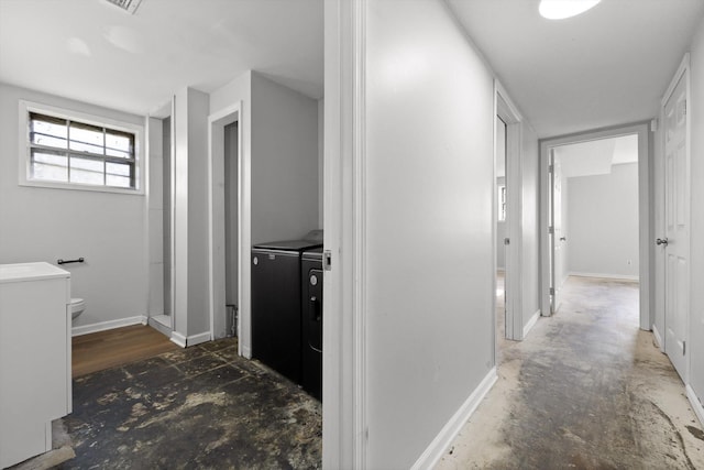 4726 Tarpon Trl, Chattanooga, TN 37416 - hallway featuring washing machine and clothes dryer and baseboards