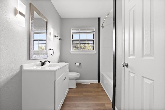 4726 Tarpon Trl, Chattanooga, TN 37416 - bathroom featuring vanity, wood finished floors, and shower / bathtub combination