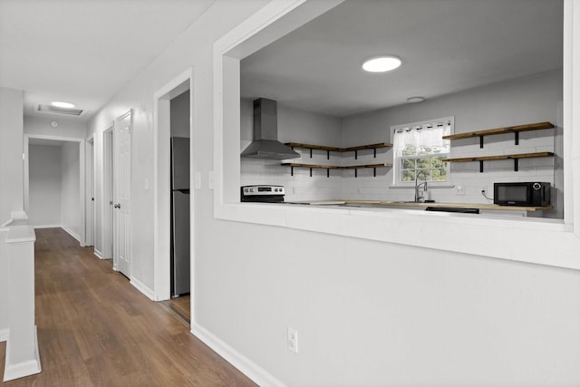 4726 Tarpon Trl, Chattanooga, TN 37416 - kitchen featuring wall chimney exhaust hood, backsplash, freestanding refrigerator, open shelves, and dark wood finished floors