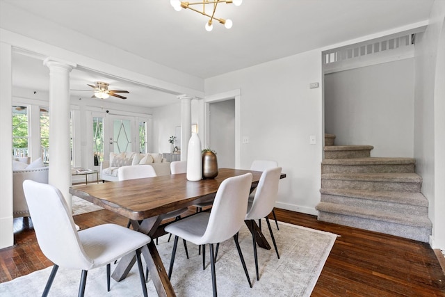 225 Hemphill Ave, Chattanooga, TN 37411 - dining space featuring decorative columns, healthy amount of natural light, stairs, and dark wood-style flooring