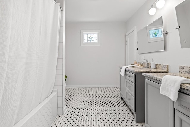 225 Hemphill Ave, Chattanooga, TN 37411 - full bathroom featuring vanity, healthy amount of natural light, and shower / bath combo
