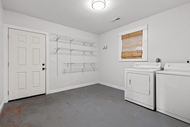 225 Hemphill Ave, Chattanooga, TN 37411 - washroom with washing machine and clothes dryer and baseboards