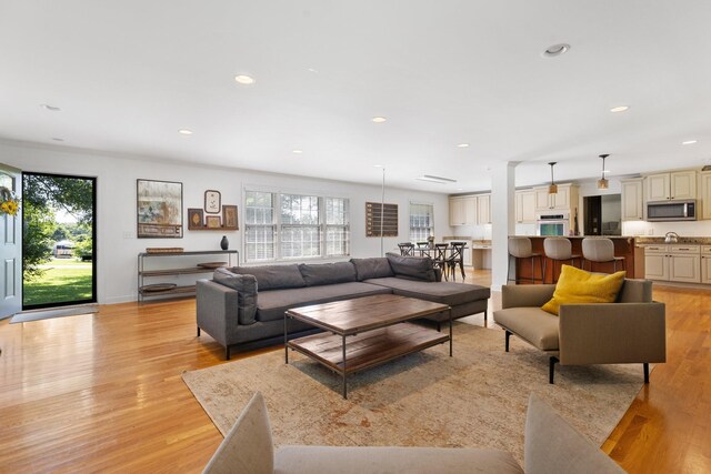 5033 Ragland Dr, Nashville, TN 37220 - living area with plenty of natural light, light wood finished floors, and recessed lighting