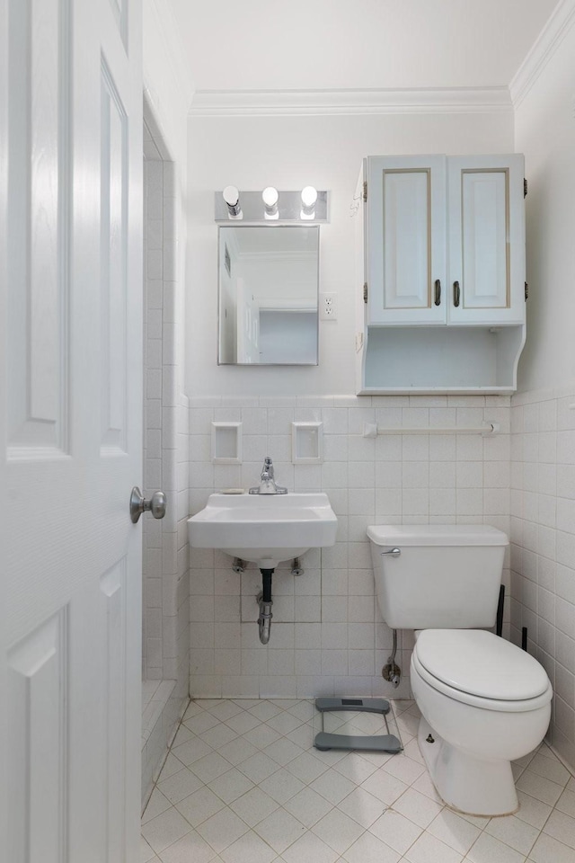 5033 Ragland Dr, Nashville, TN 37220 - bathroom featuring ornamental molding, tile patterned floors, tile walls, and wainscoting