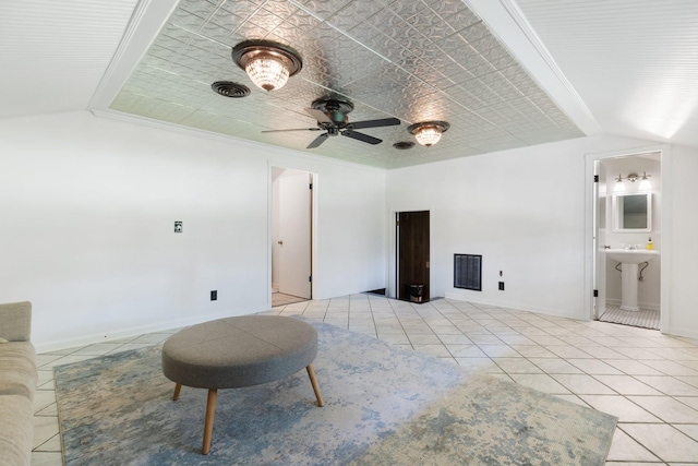 5033 Ragland Dr, Nashville, TN 37220 - living area with vaulted ceiling, light tile patterned flooring, and a ceiling fan