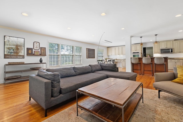 5033 Ragland Dr, Nashville, TN 37220 - living room with light wood-type flooring, recessed lighting, and ornamental molding