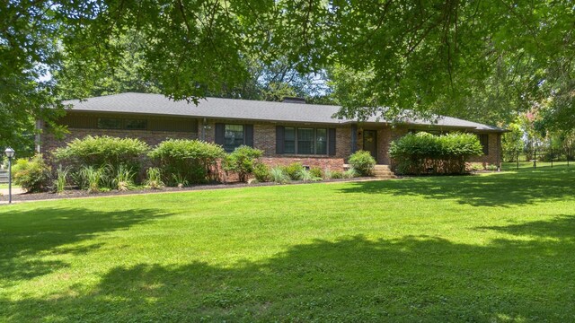 5033 Ragland Dr, Nashville, TN 37220 - ranch-style home with a front yard and brick siding
