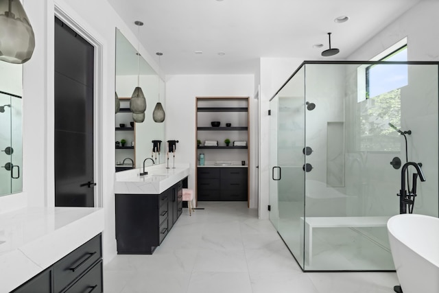 3706 Benham Ave, Nashville, TN 37215 - full bath with a shower stall, vanity, a freestanding bath, marble finish flooring, and recessed lighting