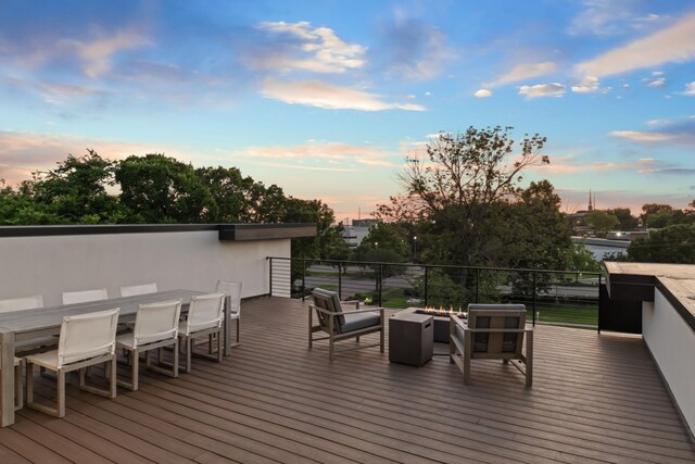 3706 Benham Ave, Nashville, TN 37215 - deck at dusk featuring outdoor dining area and an outdoor living space with a fire pit