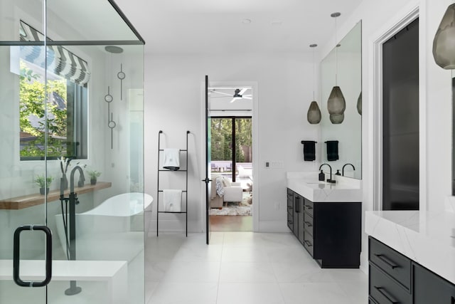 3706 Benham Ave, Nashville, TN 37215 - full bath with ensuite bath, vanity, a stall shower, ceiling fan, and a freestanding tub
