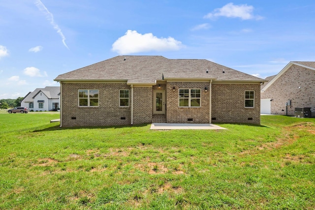 200 Creekside Dr, Lewisburg, TN 37091 - rear view of house with crawl space, a patio area, brick siding, and a lawn