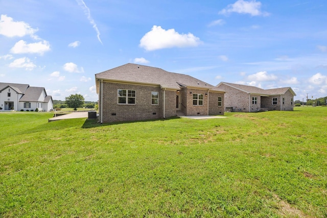 200 Creekside Dr, Lewisburg, TN 37091 - back of house featuring crawl space, a patio, brick siding, and a lawn