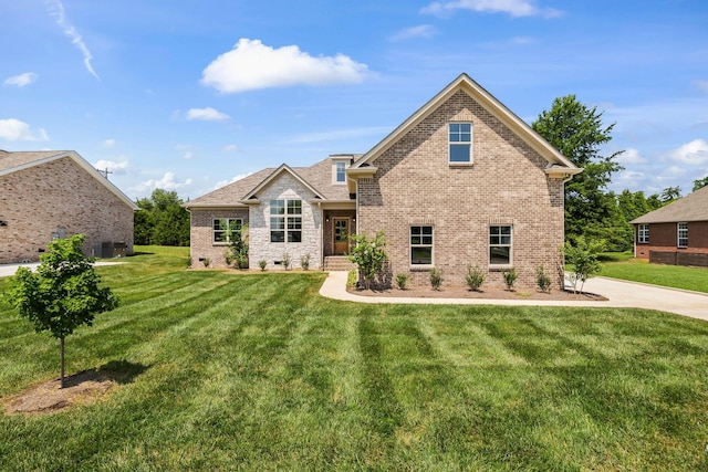 200 Creekside Dr, Lewisburg, TN 37091 - rear view of house with brick siding and a yard