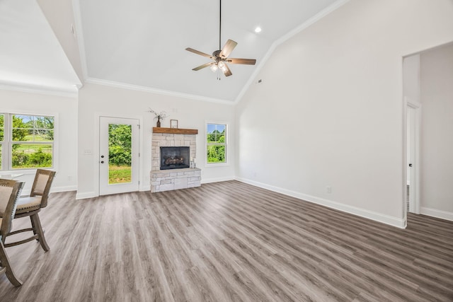 200 Creekside Dr, Lewisburg, TN 37091 - unfurnished living room with plenty of natural light, ceiling fan, wood finished floors, crown molding, and high vaulted ceiling