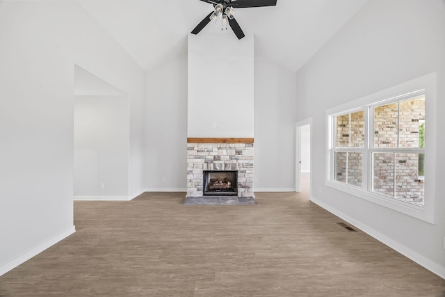 198 Creekside Dr, Lewisburg, TN 37091 - unfurnished living room with a ceiling fan, wood finished floors, high vaulted ceiling, and a fireplace