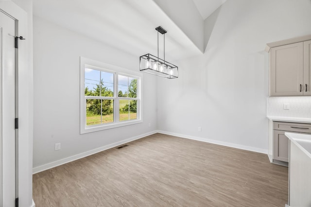 198 Creekside Dr, Lewisburg, TN 37091 - unfurnished dining area featuring light wood finished floors and a chandelier