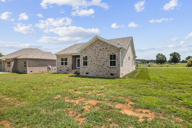 198 Creekside Dr, Lewisburg, TN 37091 - rear view of house with crawl space, brick siding, and a yard
