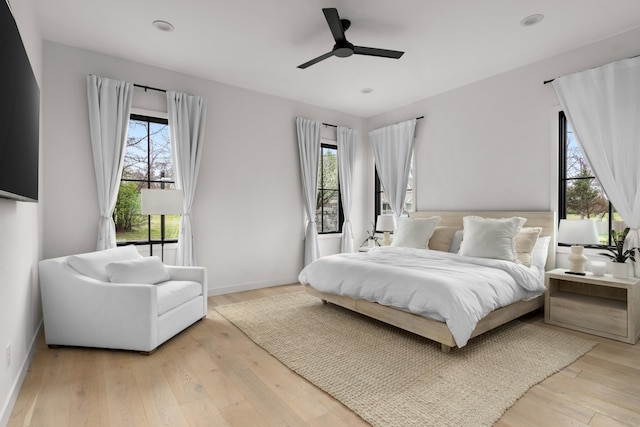 3037 Lakeshore Dr, Old Hickory, TN 37138 - bedroom with multiple windows, light wood-type flooring, and a ceiling fan