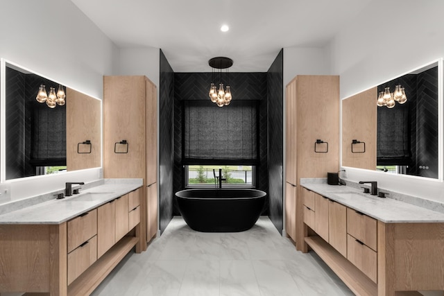 3037 Lakeshore Dr, Old Hickory, TN 37138 - full bath featuring a chandelier, a soaking tub, two vanities, and marble finish floors