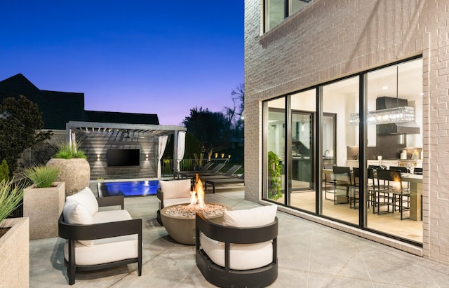 3037 Lakeshore Dr, Old Hickory, TN 37138 - patio terrace at dusk featuring a fire pit and a patio area