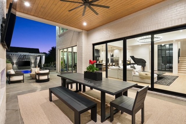 3037 Lakeshore Dr, Old Hickory, TN 37138 - patio terrace at dusk with an outdoor living space, a patio, outdoor dining space, and ceiling fan