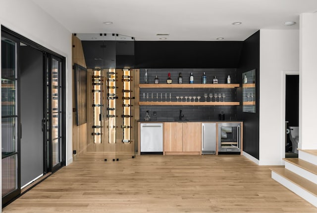 3037 Lakeshore Dr, Old Hickory, TN 37138 - indoor wet bar featuring beverage cooler, light wood finished floors, stairs, fridge, and dishwasher